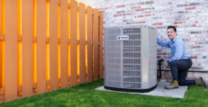 Technician working on HVAC unit