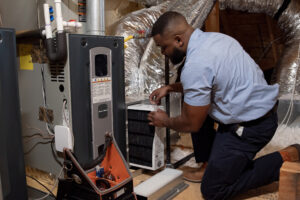 Technician working on HVAC System